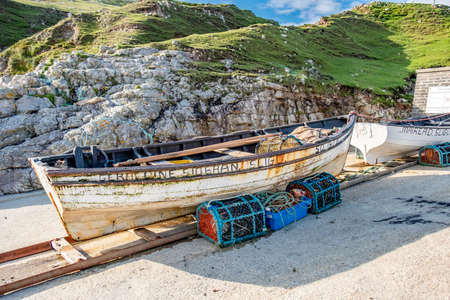 An Port, County Donegal, Ireland - August 11 2021 : Vessels lying at the harbour