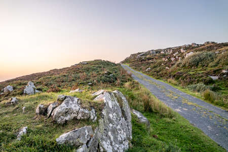 The coastal single track road between Meenacross and Crohy Head south of Dungloe, County Donegal - Irelandの写真素材