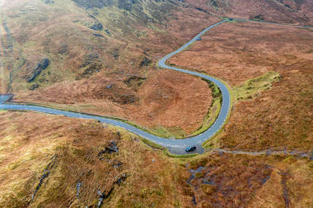 Aerial view of the R256 between Cnoc na Laragacha and the Muckish Mountain in County Donegal -...
