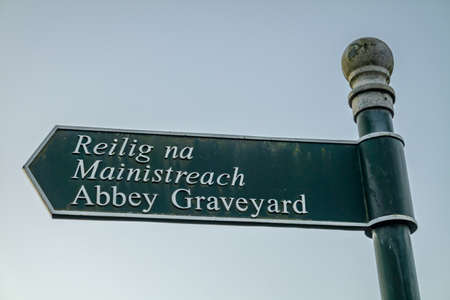 Donegal Town, Ireland - October 23 2021 : Sign showing the way to the Abbey Graveyard which was build by Hugh O Donnell in 1474のeditorial素材