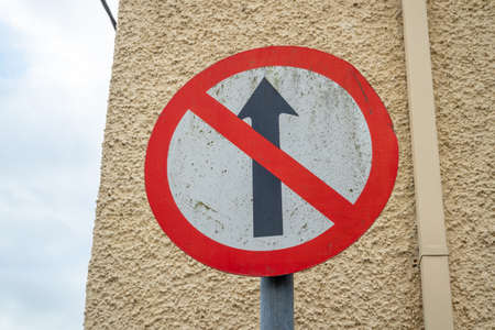 Traffic sign telling not to go straight on