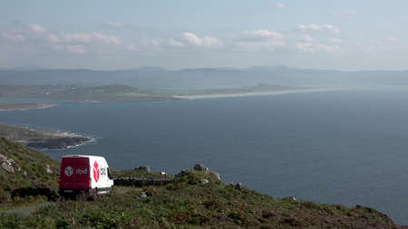 Donegal, Ireland - September 07 2021 : DPD van driving on the coastal roadのeditorial素材