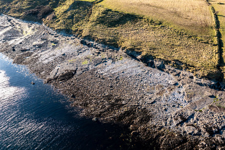 Aerial view of the amazing rocky coast at Ballyederland by St Johns Point in County Donegal - Ireland.の写真素材