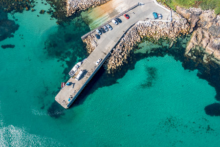 Aerial view of the pier at Leabgarrow on Arranmore Island in County Donegal, Republic of Irelandの写真素材