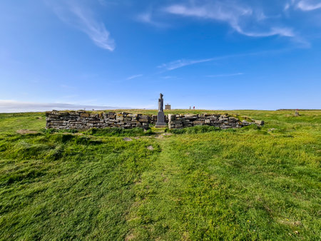 Ballycastle,County Mayo, Republic of Ireland - July 15 2022 : Saint Patrick statue is standing at Downpatrick head not far from the sea stackのeditorial素材