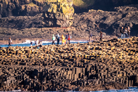 Giants Causeway, Northern Ireland, UK - November 05 2022 : People enjoying the 40000 interlocking basalt columnsのeditorial素材