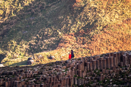 Giants Causeway, Northern Ireland, UK - November 05 2022 : People enjoying the 40000 interlocking basalt columnsのeditorial素材