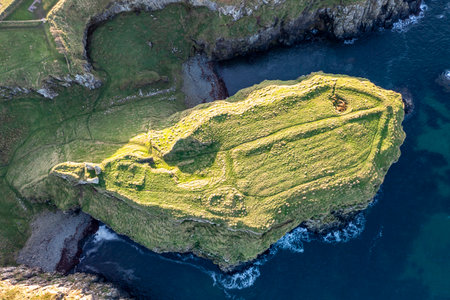 Dunseverick Castle is located west of the village of Dunseverick, in County Antrim, in Northern Ireland.の写真素材