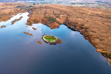 Aerial view of Lough Doon between Portnoo and Ardara which is famous for the medieval fort - County Donegal - Ireland.の写真素材
