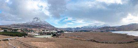 Aerial view of the snow covered Mount Errigal, the highest mountain in Donegal - Ireland.の写真素材