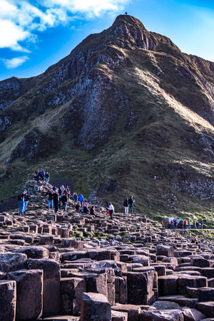 Giants Causeway, Northern Ireland, UK - November 05 2022 : People enjoying the 40000 interlocking basalt columnsのeditorial素材