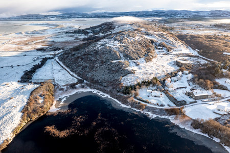 Aerial view of snow covered Cashelgoland by Portnoo in County Donegal, Ireland.の写真素材