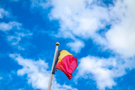 Flag of Belgium waving in the windの写真素材