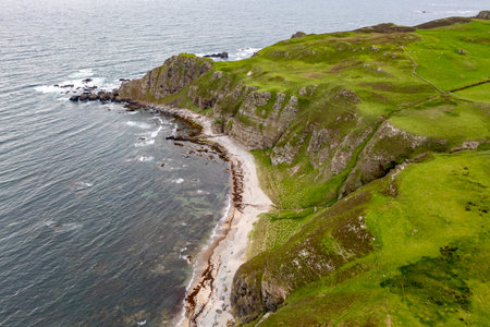 Aerial view of Dunargus Head close to the Five Fingers Strand in County Donegal, Irelandの写真素材