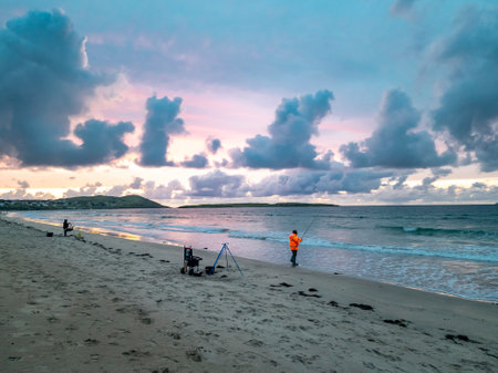 Fishing at Narin, Portnoo strand during amazing sunset in County Donegal - Irelandの写真素材