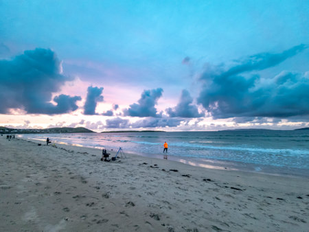 Fishing at Narin, Portnoo strand during amazing sunset in County Donegal - Irelandの写真素材