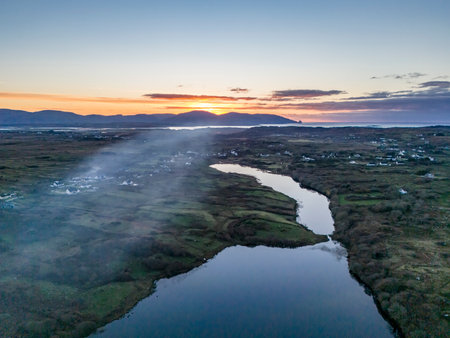 Smoke over Lough Fad due to traditionally burning of waste in rural Ireland - County Donegal