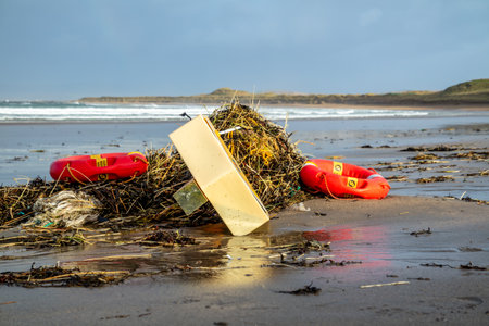 Narin, Portnoo, Ireland - January 15 2020 : Ringbuoy lying on Portnoo beach in County Donegal after storm Brendanのeditorial素材