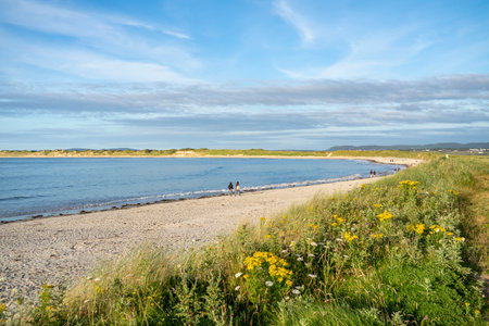 Magheraroarty, Ireland - July 31 2022: Holiday makers enjoying the areのeditorial素材