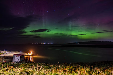 The Aurora Borealis, the northern lights, showing up in Portnoo, County Donegal, Ireland.の写真素材