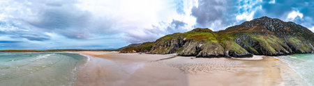 Aerial view of the beach and caves at Maghera Beach near Ardara, County Donegal - Ireland.の写真素材
