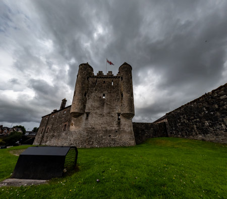 Enniskillen Castle is standing on the banks of Lough Erne in Northern Ireland. Dramatic cloudsの写真素材