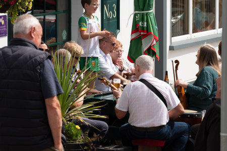 Dungloe, County Donegal, Ireland - July 31 2025 : Locals and visitors enjoy the Mary From Dungloe International Arts Festivalのeditorial素材