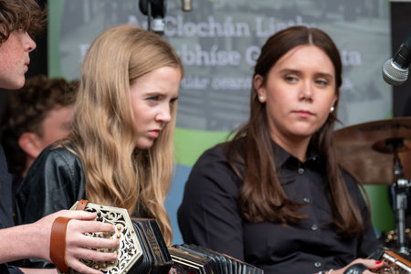 Dungloe, County Donegal, Ireland - July 31 2025 : Draiocht na hOige youth orchestra is performing at the Mary From Dungloe International Arts Festivalのeditorial素材