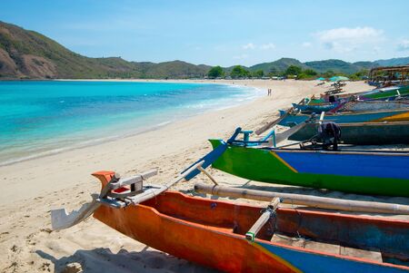 Fishing boats on Mawun beach - Lombok, Indonesia.の写真素材