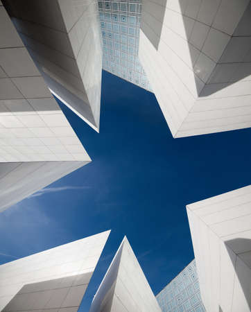 Modern architecture. Abstract pattern of shadows and light on diagonal lines of contemporary facadeの写真素材