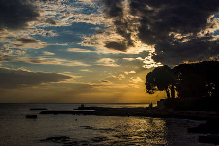 Beautiful sunset above the sea in Umag, Istria in Croatia, Europe.の写真素材