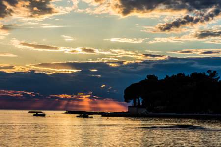 Beautiful sunset above the sea in Umag, Istria in Croatia, Europe.の写真素材