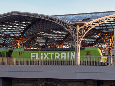 Cologne, Germany - February 13, 2022: Green Flixtrain train at the railway station.