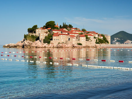 Sveti Stefan Island at sunrise seen from the beach. Budva Riviera in Montenegro.のeditorial素材