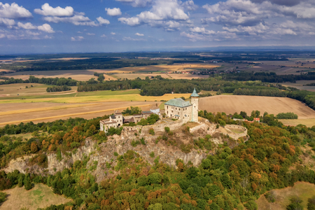 Aerial photo of beautiful medieval castle KunÄtickÃ¡ hora near city of Pardubice in the heart of Czech Republic on the top of the hill in surrouding lowlands and villages nearby from ultralight planeのeditorial素材