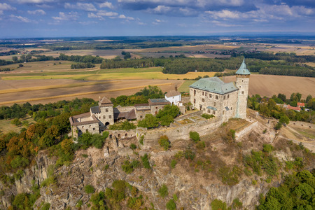 Aerial photo of beautiful medieval castle KunÄtickÃ¡ hora near city of Pardubice in the heart of Czech Republic on the top of the hill in surrouding lowlands and villages nearby from ultralight planeのeditorial素材