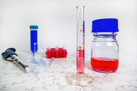 Medical and scientific laboratory equipment - beaker, cylinder, pipette, fluids, vial, ampoule stand and moreの写真素材