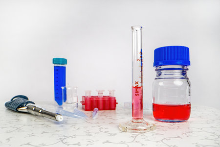Medical and scientific laboratory equipment - beaker, cylinder, pipette, fluids, vial, ampoule stand and moreの写真素材