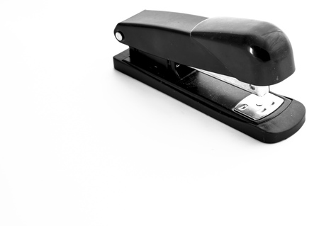 Black stapler isolated on white backgroundの写真素材