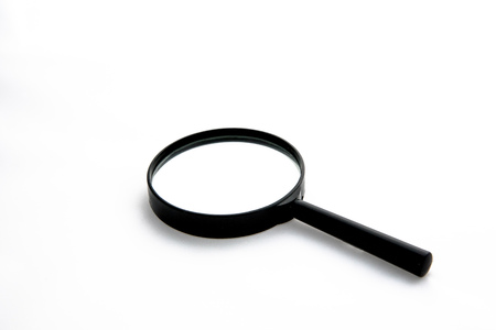 Magnifying glass isolated on whiteの写真素材