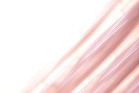 Elegant striped red and orange background pattern fading into white spaceの写真素材