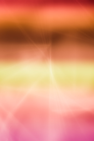 Abstract blurred background with lighting effect for graphic design - orange, red, yellowの写真素材