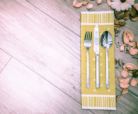 Table setting with cutlery and napkinの写真素材
