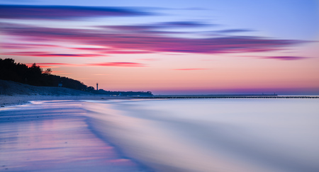 Ocean sunset sky - gorgeous panorama twilight sky and peaceful water backgroundのeditorial素材