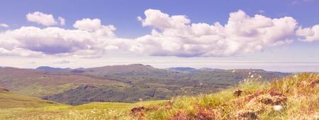 Beautiful panoramic images from isle of skye island in the Highlands of Scotland - amazing views, breathable,storm, dark clouds, a real celebration of nature - enjoy the wildernessの写真素材