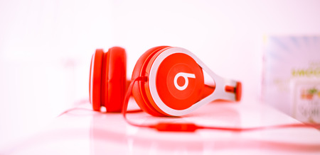 Stirling/Scotland - 7 July 2019: Beats by Dr. Dre red headphonesのeditorial素材