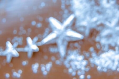 Christmas, Xmas - Snowflakes and Silver Star blurred in snowing background