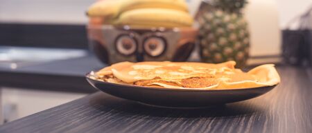 Fresh and tasty homemade crepes in modern kitchen - pancake day