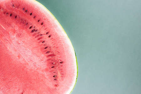 Watermelon close up on green background - tasty fruits