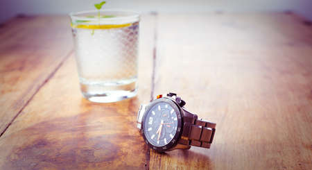 Alloa, Scotland - 17 July 2019 - wrist watch isolated on a wooden background. Accurist man watchのeditorial素材